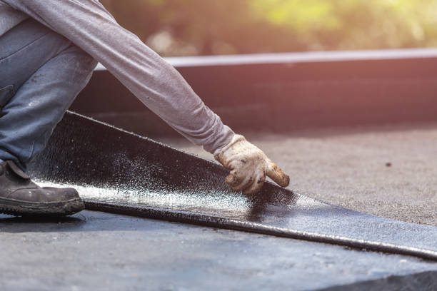 Professional Waterproofing technician working in Utica, OH
